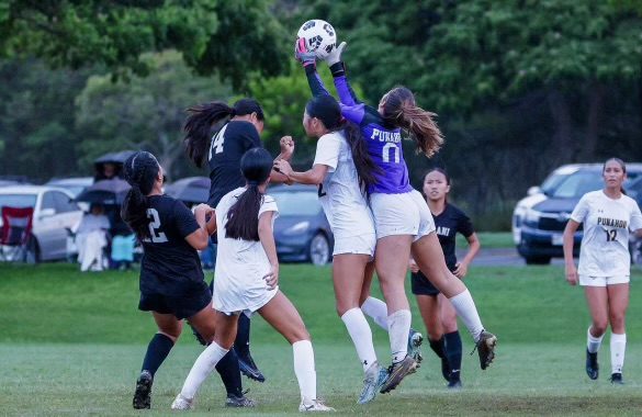 Stella making a save as Punahou goalkeeper against Iolani