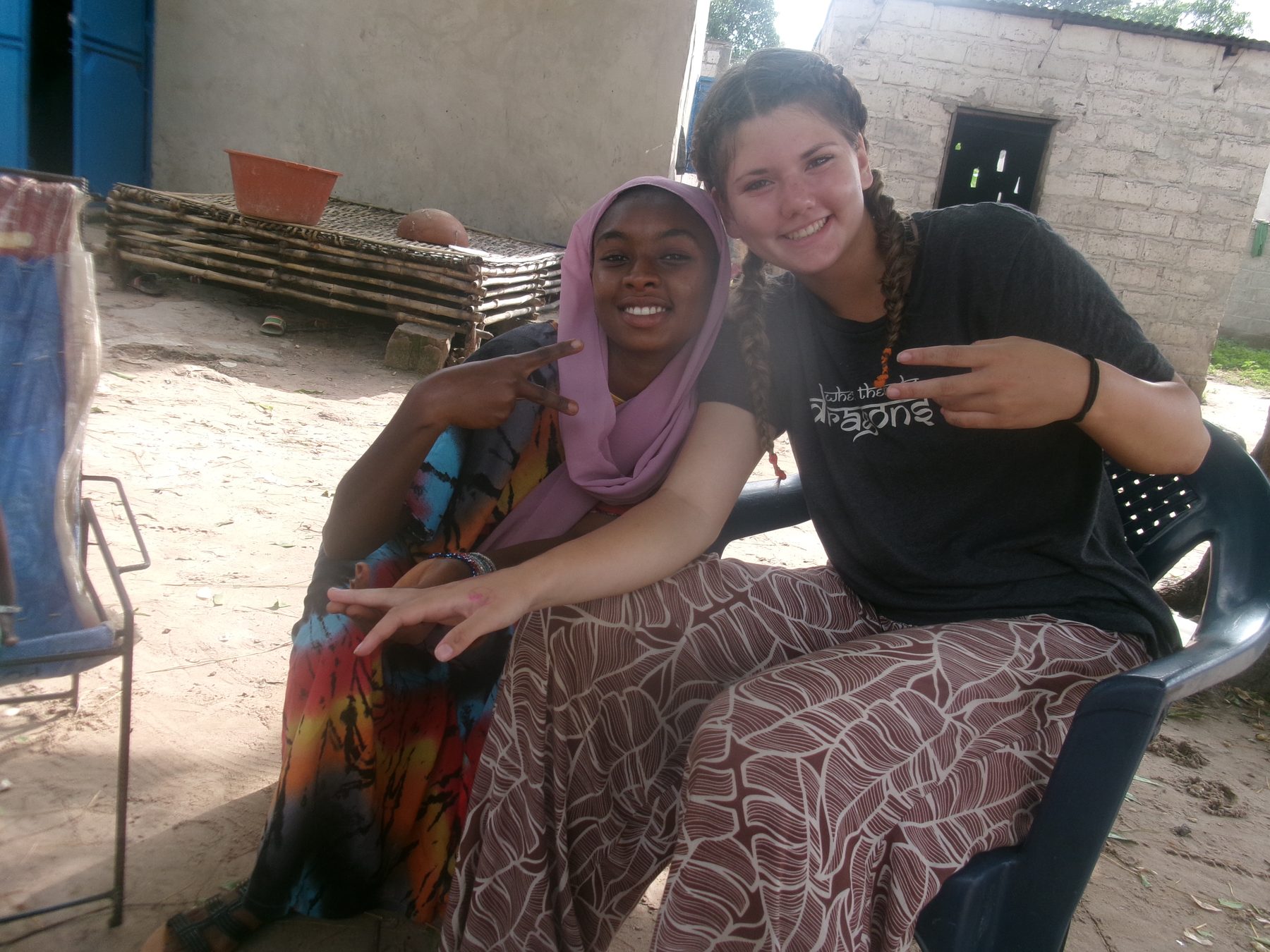 Stella sitting with a friend in Senegal